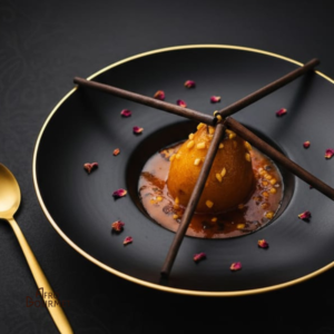 Poire fondante farcie aux fruits exotiques, nappée de caramel